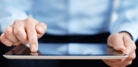 picture showing a person holding a tablet