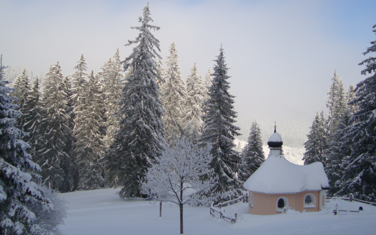 small chapel under the snow with trees illustrating the article about main csr/sustainability trends in 2016
