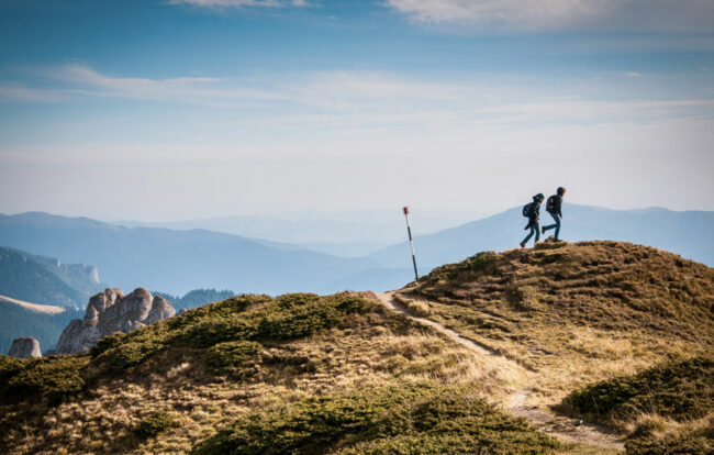 picture showing a couple hiking